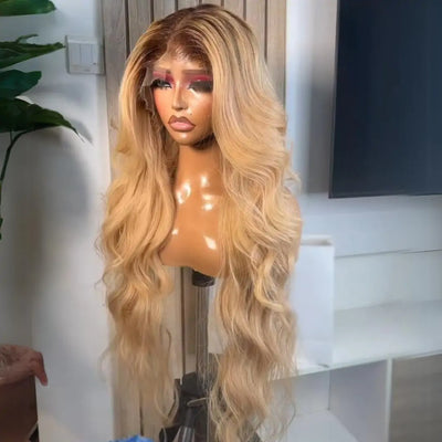 Perruques Body Wave blondes miel 13x4 HD transparentes en cheveux humains avec racines noires pré-épilées